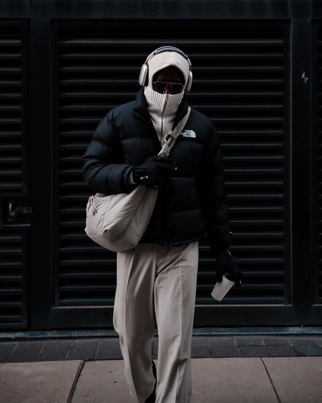 Winter streetwear, black coat and scarf